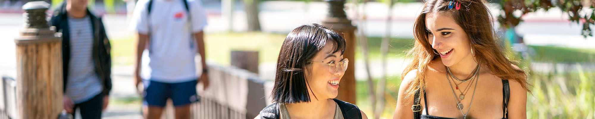 two female students walking on campus